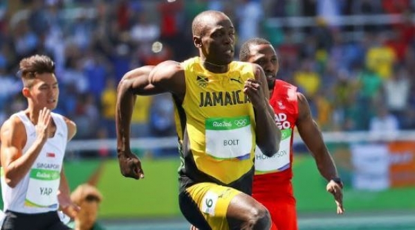 Jamaican Usain Bolt  with a fresh hair cut,won his 100 meters heat after what he called a 